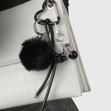 Praelia | Black Pom-Pom Heart Charm – Chic, Modern & Playful