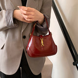 Sofie Saddle Bag – Glossy Burgundy Vegan Leather Shoulder Bag