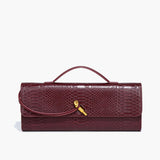 Mira | Snake-Embossed Vegan Leather Clutch – Top Handle & Gold Twist Lock