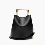 Modern Sculptural Leather Handbag – Minimalist Design with Gold Handle