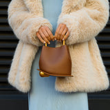 Modern Sculptural Leather Handbag – Minimalist Design with Gold Handle