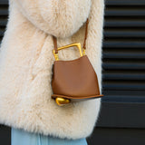 Modern Sculptural Leather Handbag – Minimalist Design with Gold Handle