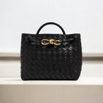 Black woven leather handbag with top handle and gold knot rope detail -Aurora-Bags.com