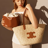 Women's Vintage Straw Woven Tote Bag with Leather Handles and Decorative Emblem