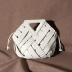 Unique Woven Leather Crossbody Bag – Distinctive Triangle Handle & Bucket Style
