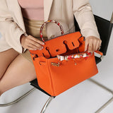 Structured Designer Satchel – Elegant Leather Handbag with Scarf-Wrapped Handles