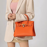 Structured Designer Satchel – Elegant Leather Handbag with Scarf-Wrapped Handles