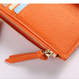 Emma | Orange Pebbled Leather Mini Wallet – Chic & Compact