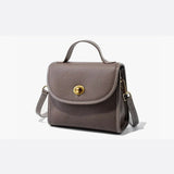 Aurora Signature Trapeze Bag – Structured Handbag with Turn-Lock Closure