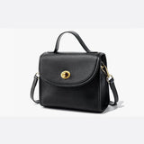 Aurora Signature Trapeze Bag – Structured Handbag with Turn-Lock Closure