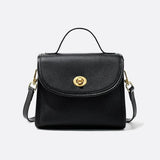 Aurora Signature Trapeze Bag – Structured Handbag with Turn-Lock Closure
