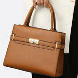 Aurora Signature Trapeze Bag – Structured Handbag with Turn-Lock Closure