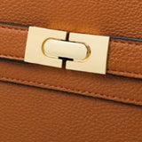 Aurora Signature Trapeze Bag – Structured Handbag with Turn-Lock Closure