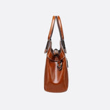 Vintage Leather Handbag with Top Handle and Detachable Strap