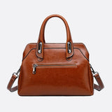 Vintage Leather Handbag with Top Handle and Detachable Strap