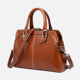 Vintage Leather Handbag with Top Handle and Detachable Strap