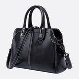 Vintage Leather Handbag with Top Handle and Detachable Strap