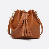Camel Leather Bucket Bag with Tassels – Chic, Compact & Versatile