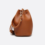 Camel Leather Bucket Bag with Tassels – Chic, Compact & Versatile